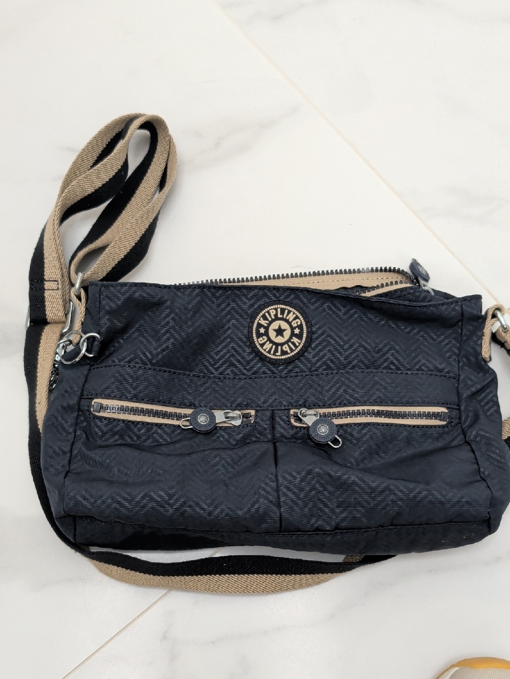 Kipling Black Crossbody Bag with Tan-Accented Strap